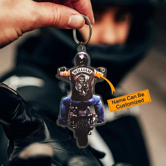 Custom name on the  back of biker riding motorcycle keychain