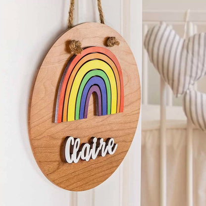 custom wood rainbow name sign for kids hanging on the wall