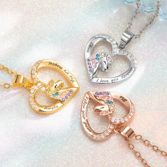 Three color of  unicorn heart shape pendants which is gold, silver and red rose color 