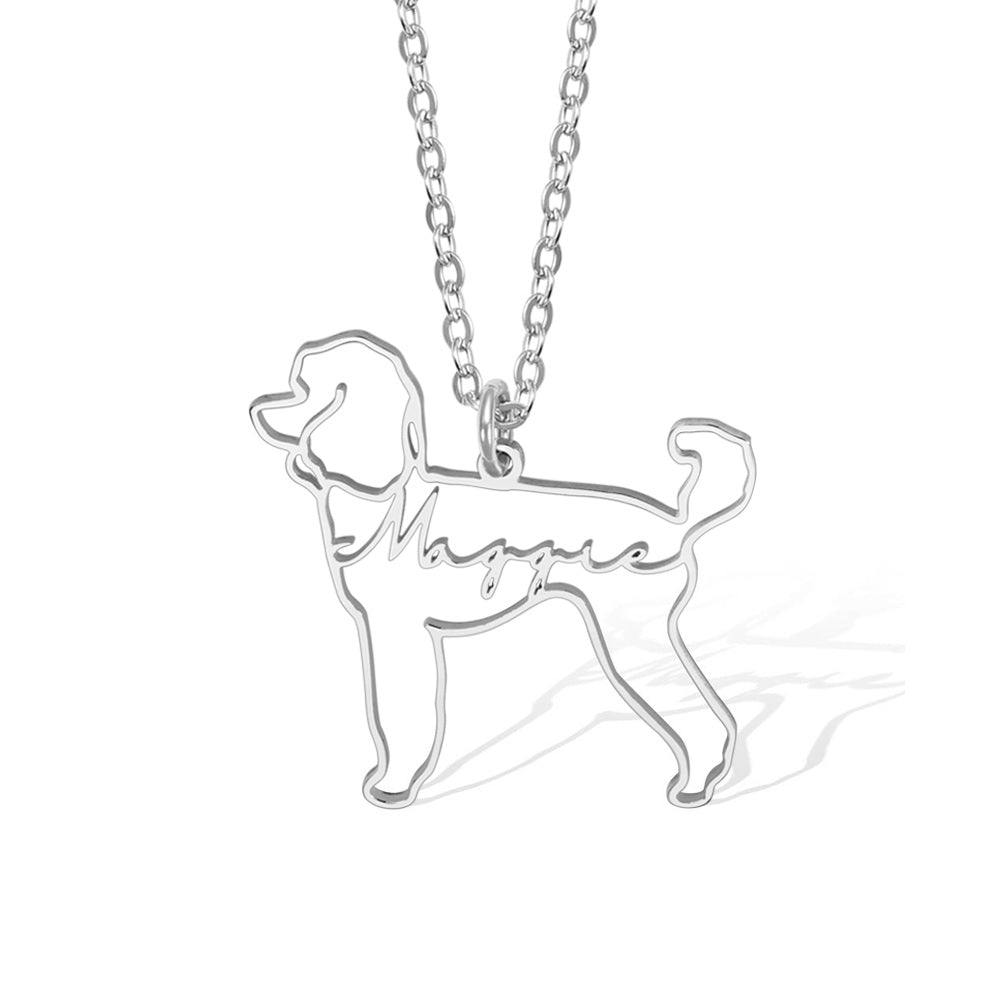 A custom  silver dog  outline pendant necklace with it's name Maggie